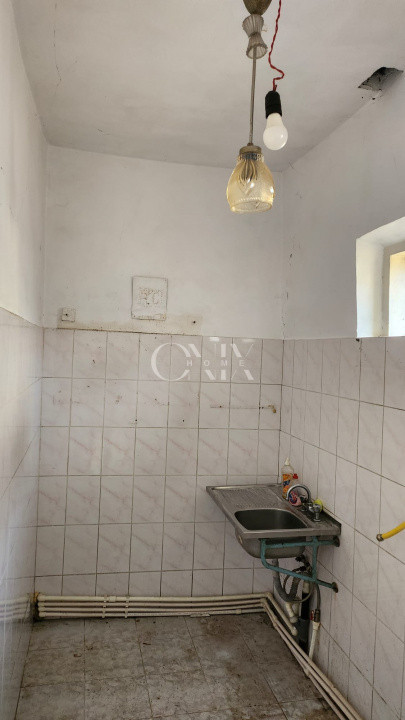 Casa 2 camere, garaj,Medeea, teren 370 mp, deschidere 14 ml